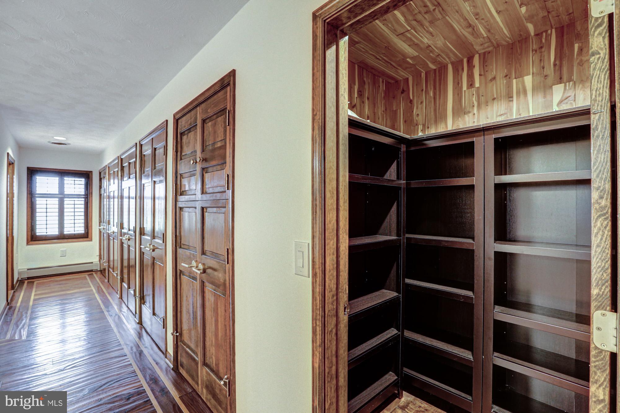 550 Green Giant Road Townsend, DE 19734 - Photo 71 of 145 a view of a hallway with wooden floor and a window