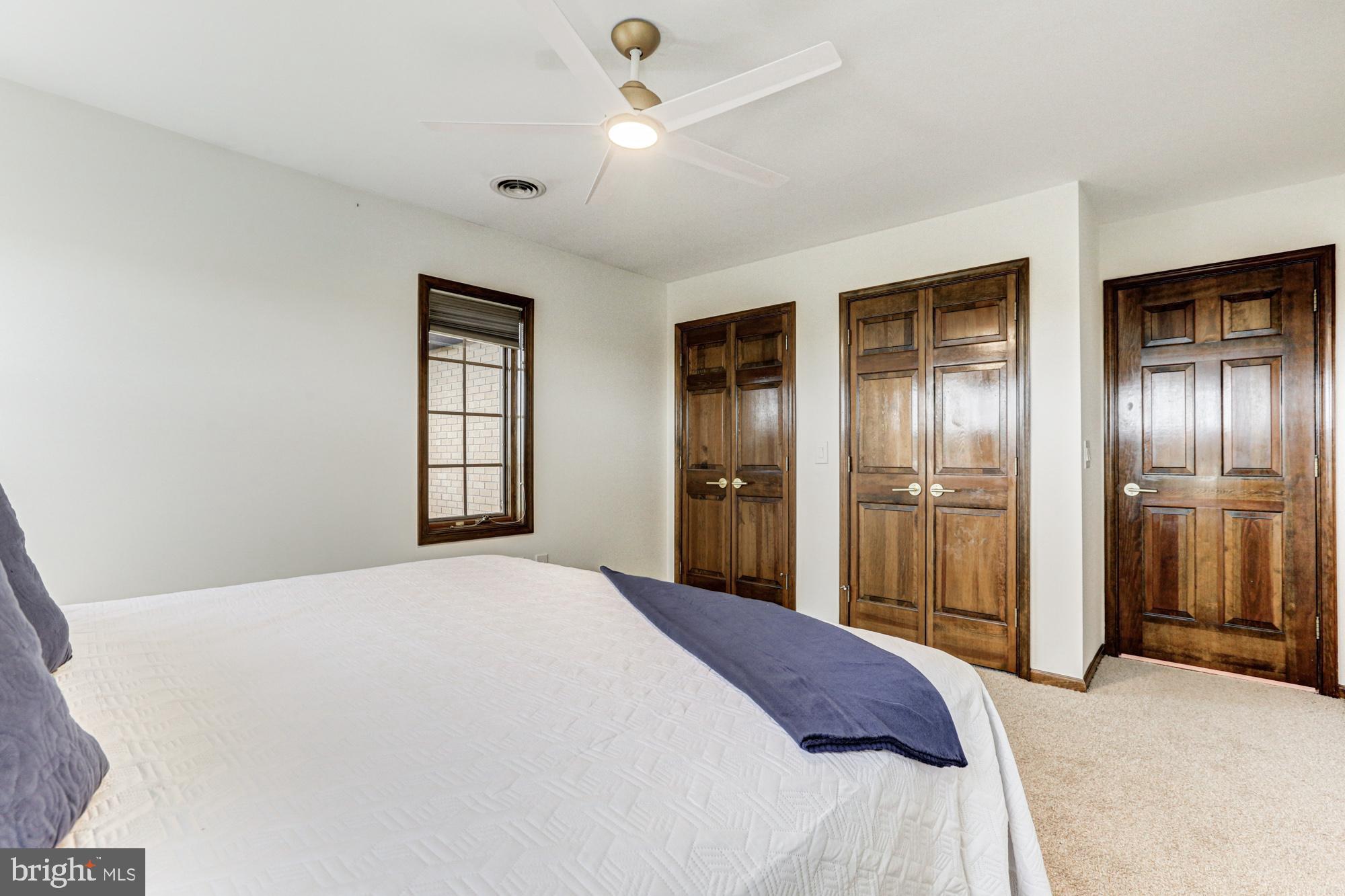 550 Green Giant Road Townsend, DE 19734 - Photo 99 of 145 a bedroom with a large bed and a closet