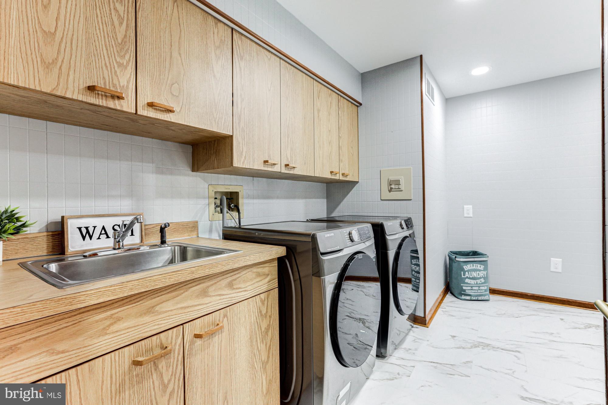 550 Green Giant Road Townsend, DE 19734 - Photo 100 of 145 a kitchen with stainless steel appliances granite countertop a sink a stove and white cabinets