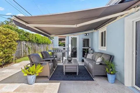 a outdoor living space with furniture and garden view
