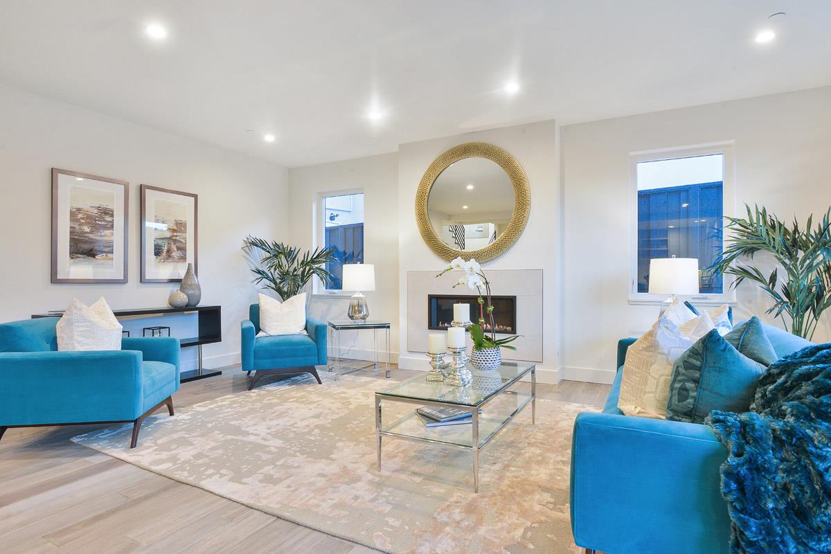 300 Helen Drive Millbrae, CA 94030 - Photo 3 of 16 a living room with furniture a fireplace and a potted plant