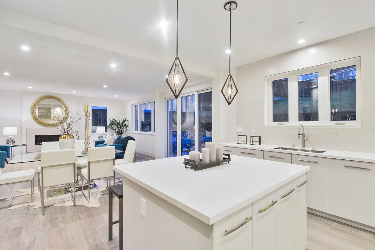 300 Helen Drive Millbrae, CA 94030 - Photo 9 of 16 a kitchen with a table and chairs in it
