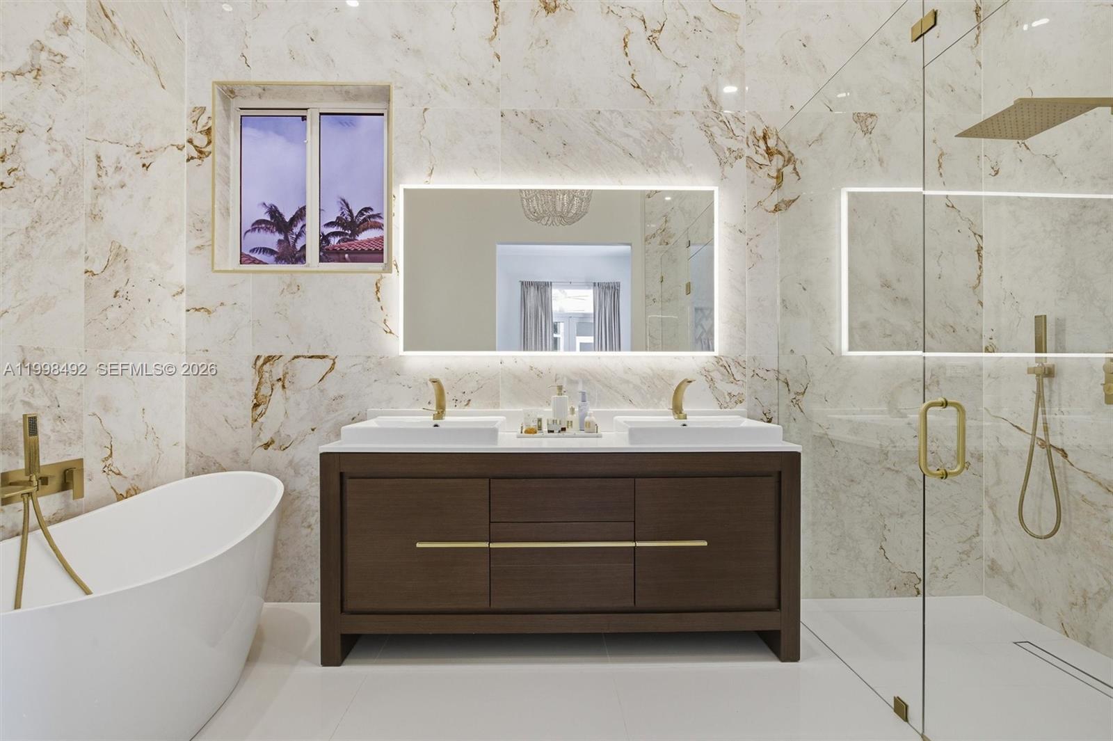 9717 Southwest 94th Terrace Miami, FL 33176 - Photo 28 of 63 a bathroom with a tub sink and mirror