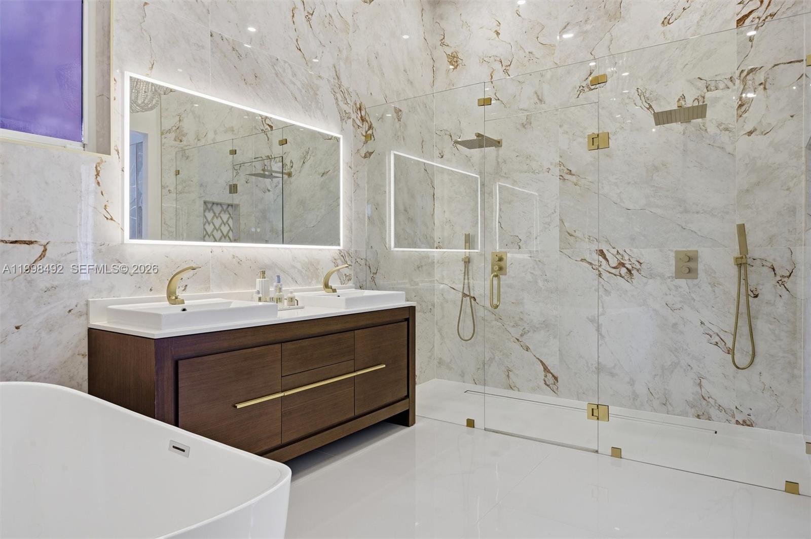 9717 Southwest 94th Terrace Miami, FL 33176 - Photo 29 of 63 a bathroom with a sink and mirror
