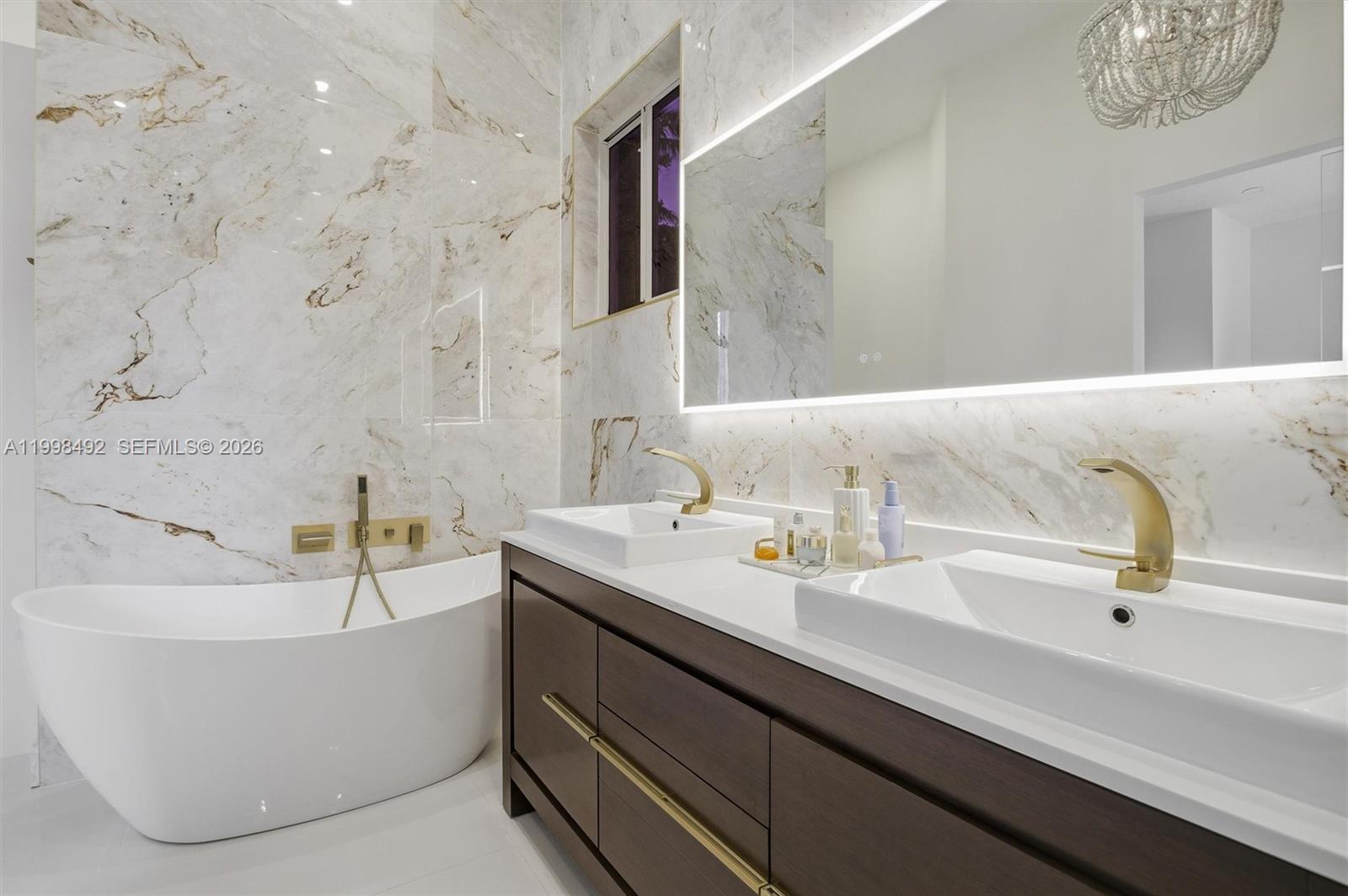 9717 Southwest 94th Terrace Miami, FL 33176 - Photo 30 of 63 a bathroom with a bathtub and a sink
