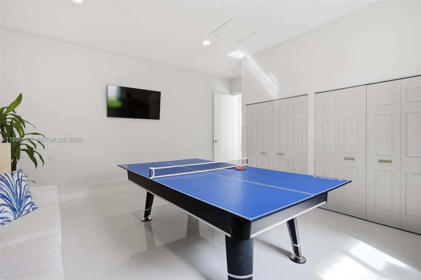 9717 Southwest 94th Terrace Miami, FL 33176 - Photo 33 of 63 a room with furniture pool table and windows