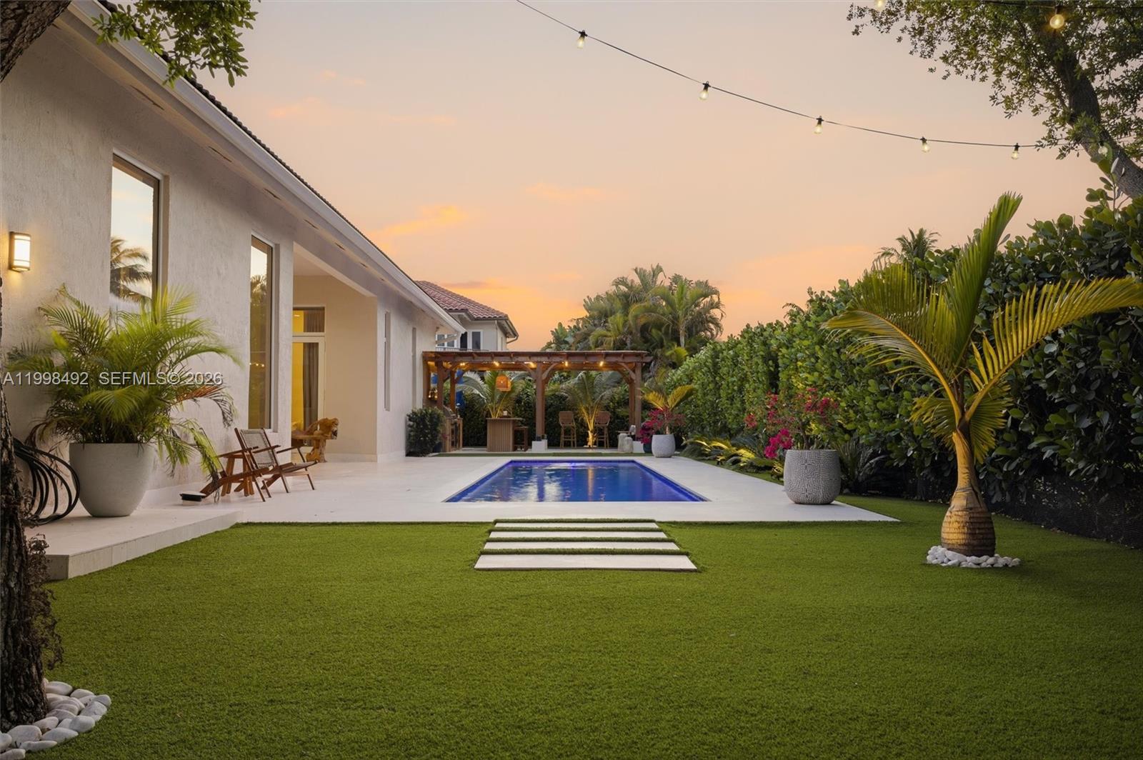 9717 Southwest 94th Terrace Miami, FL 33176 - Photo 46 of 63 a view of a patio with swimming pool