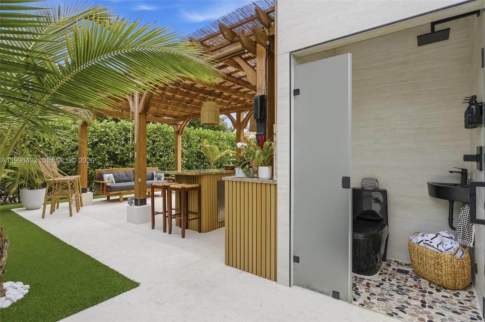 9717 Southwest 94th Terrace Miami, FL 33176 - Photo 55 of 63 a view of two chairs and table in patio
