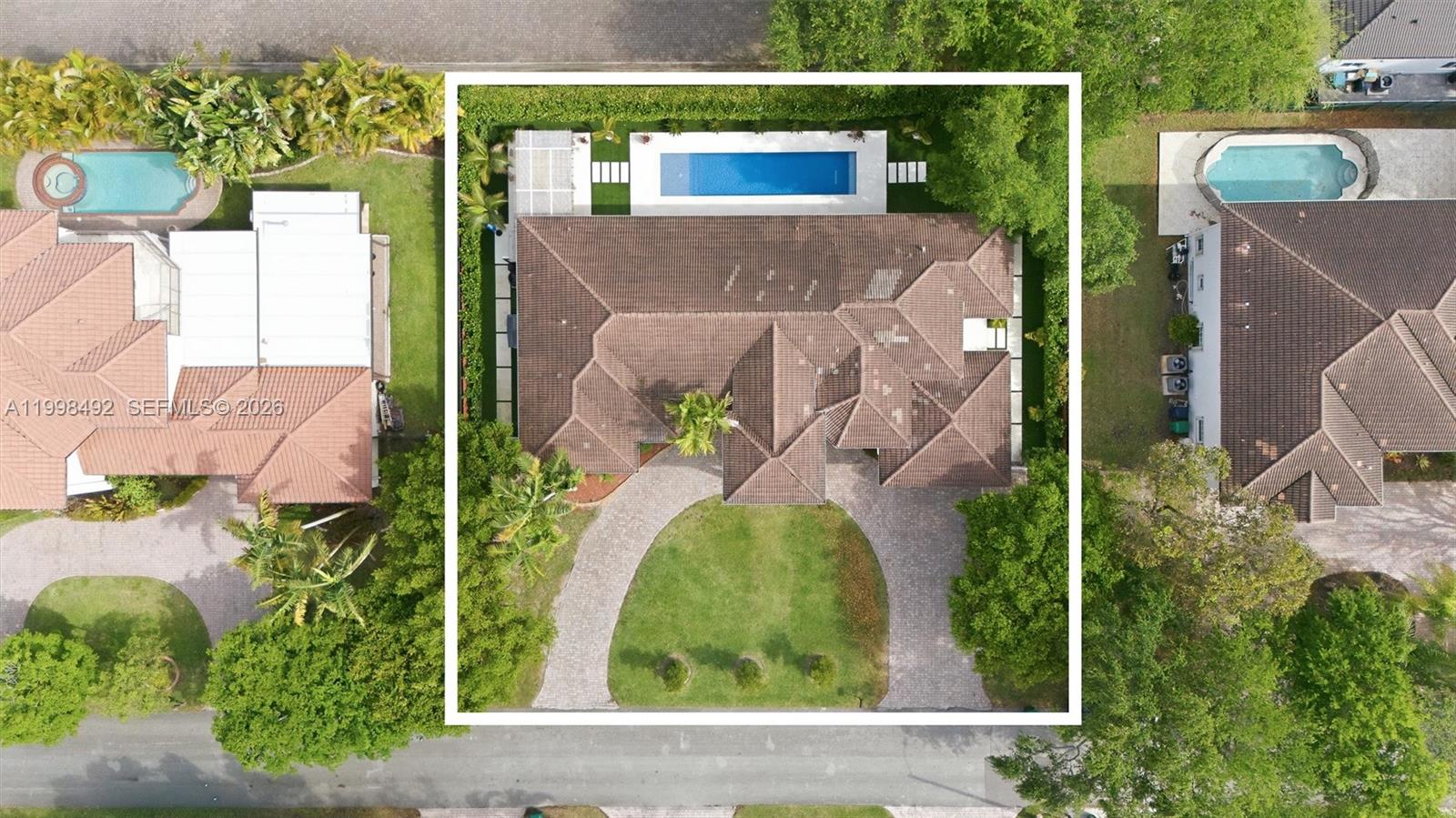 9717 Southwest 94th Terrace Miami, FL 33176 - Photo 59 of 63 aerial view of a house with a yard and plants
