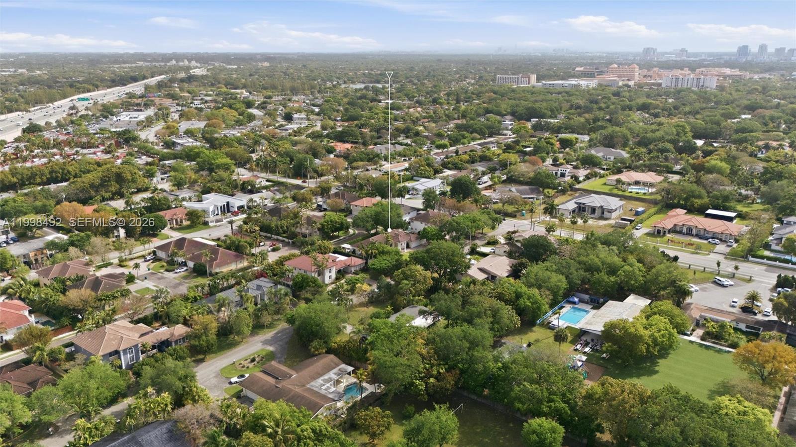 9717 Southwest 94th Terrace Miami, FL 33176 - Photo 61 of 63 an aerial view of a city with lots of residential buildings