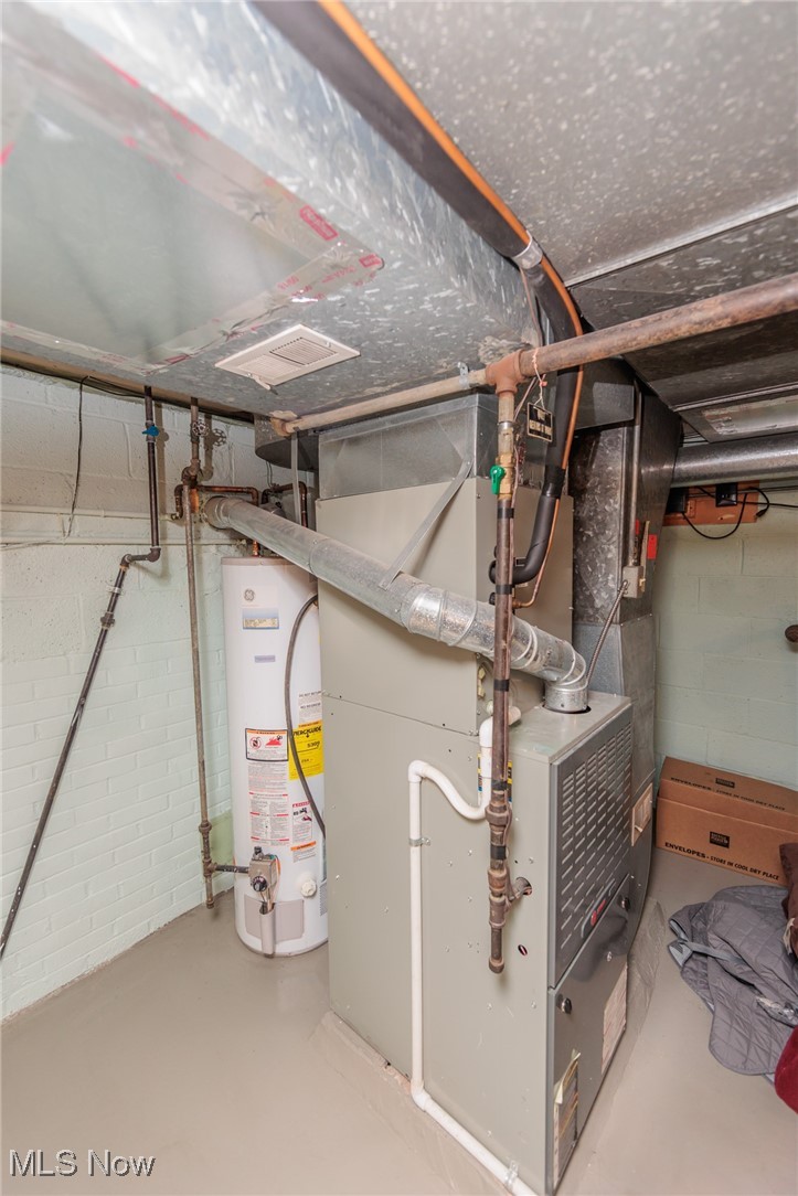 5445 Hauserman Road Cleveland, OH 44130 - Photo 41 of 45 Utility room with gas water heater