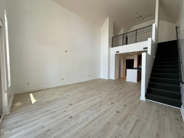 a view of a livingroom with wooden floor