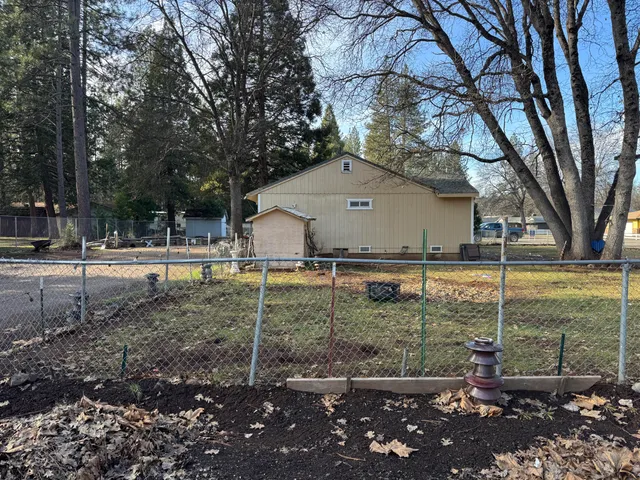 a house view with a yard