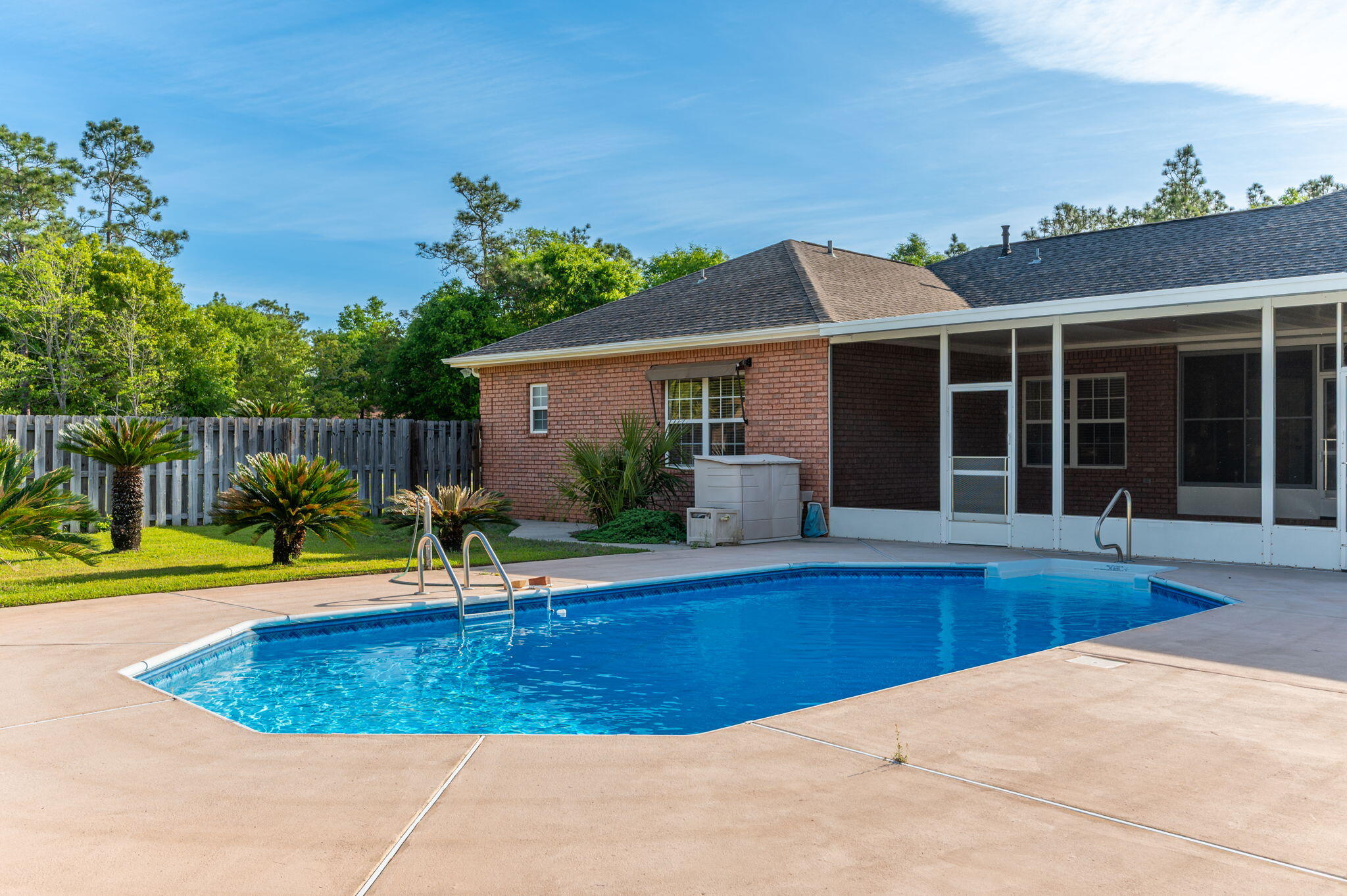 5552 Frontier Drive Crestview, FL 32536 - Photo 45 of 50 a swimming pool with barbeque oven in front of it