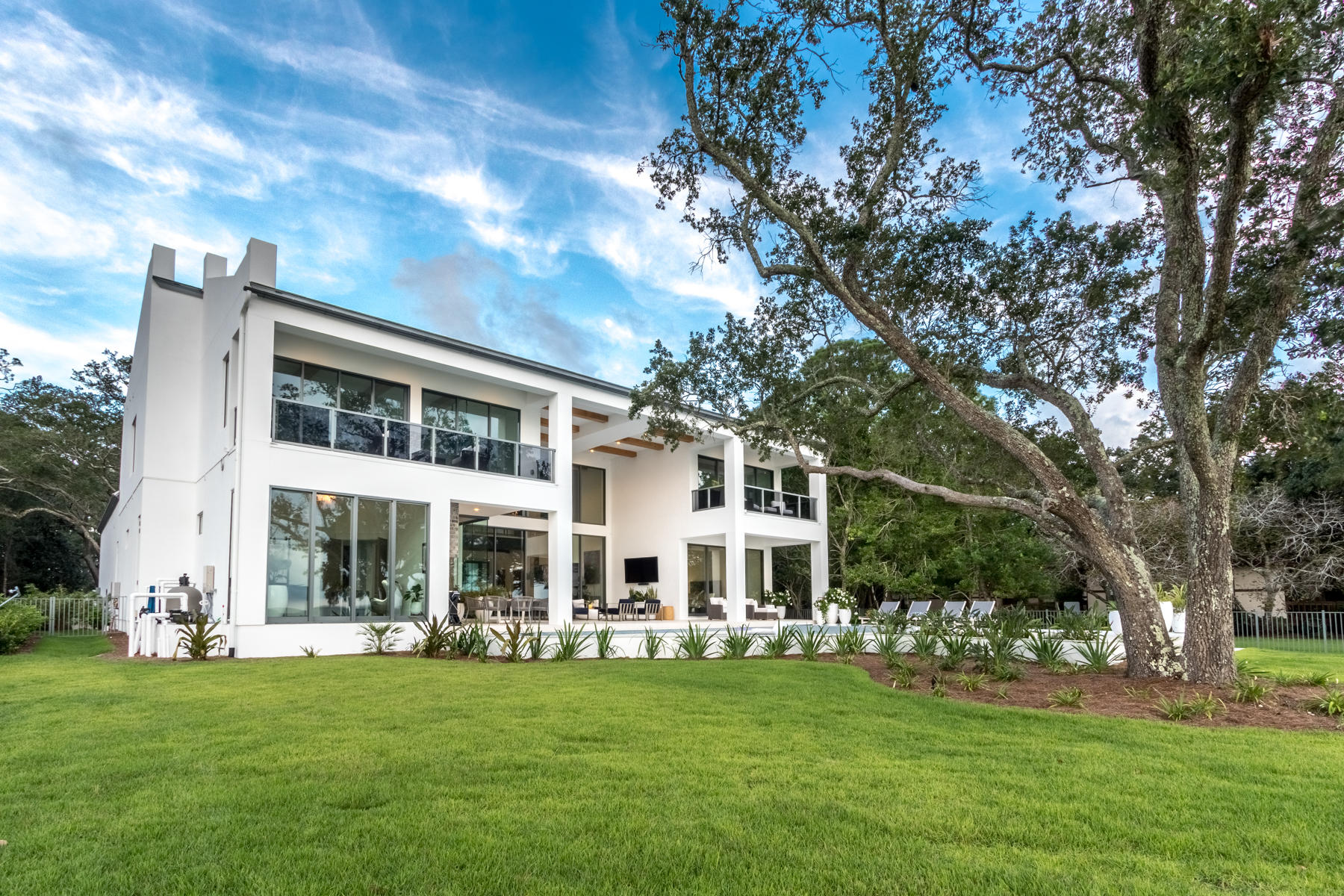 337 Driftwood Point Road Santa Rosa Beach, FL 32459 - Photo 19 of 82 a front view of a house with a garden