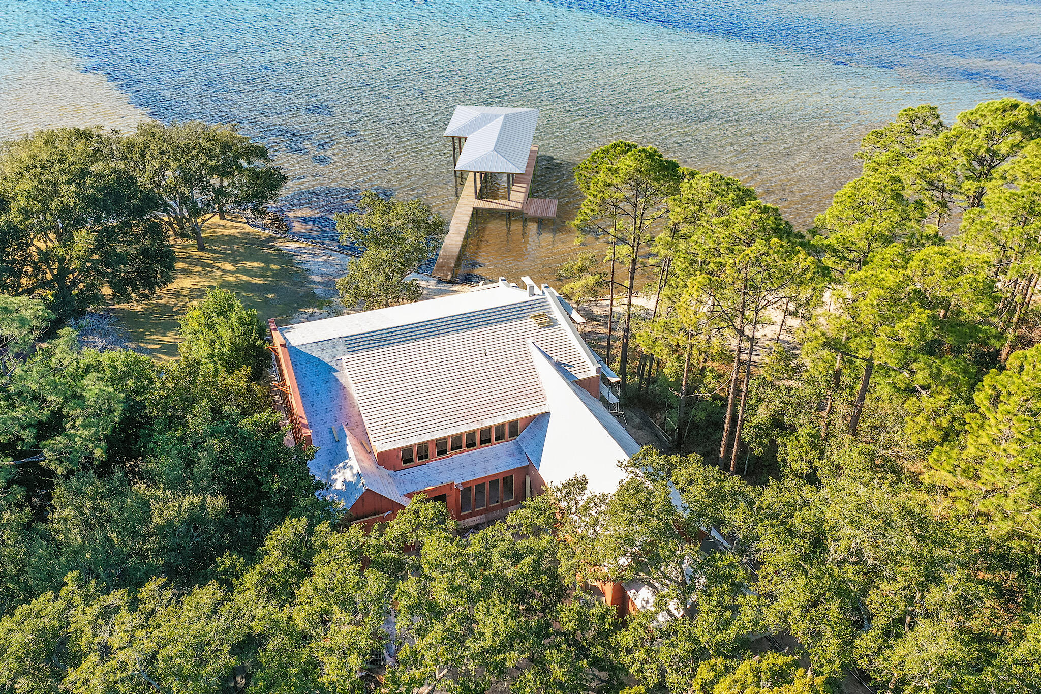 337 Driftwood Point Road Santa Rosa Beach, FL 32459 - Photo 22 of 82 an aerial view of a house with a yard and large trees