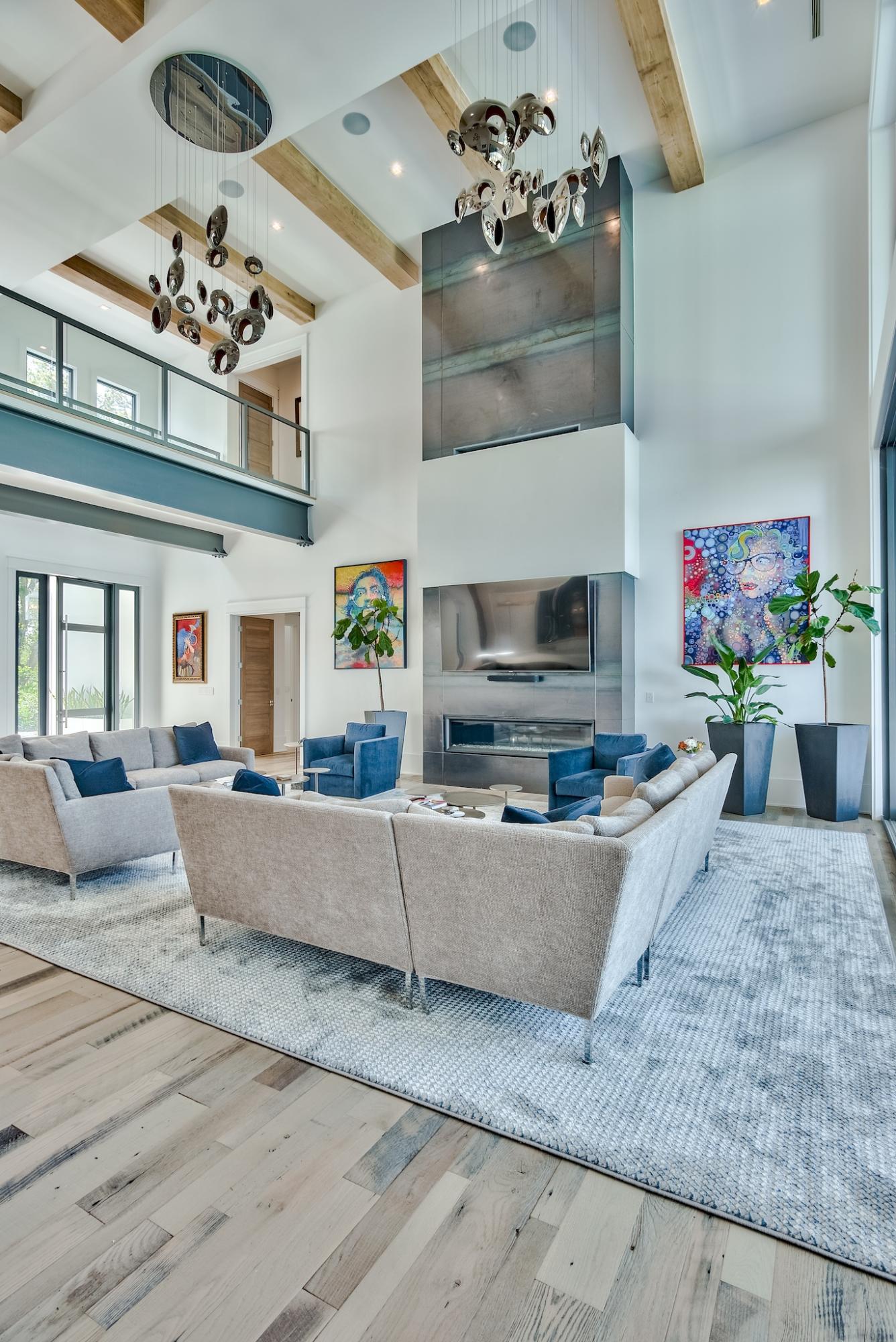 337 Driftwood Point Road Santa Rosa Beach, FL 32459 - Photo 28 of 82 a living room with furniture a chandelier and fireplace