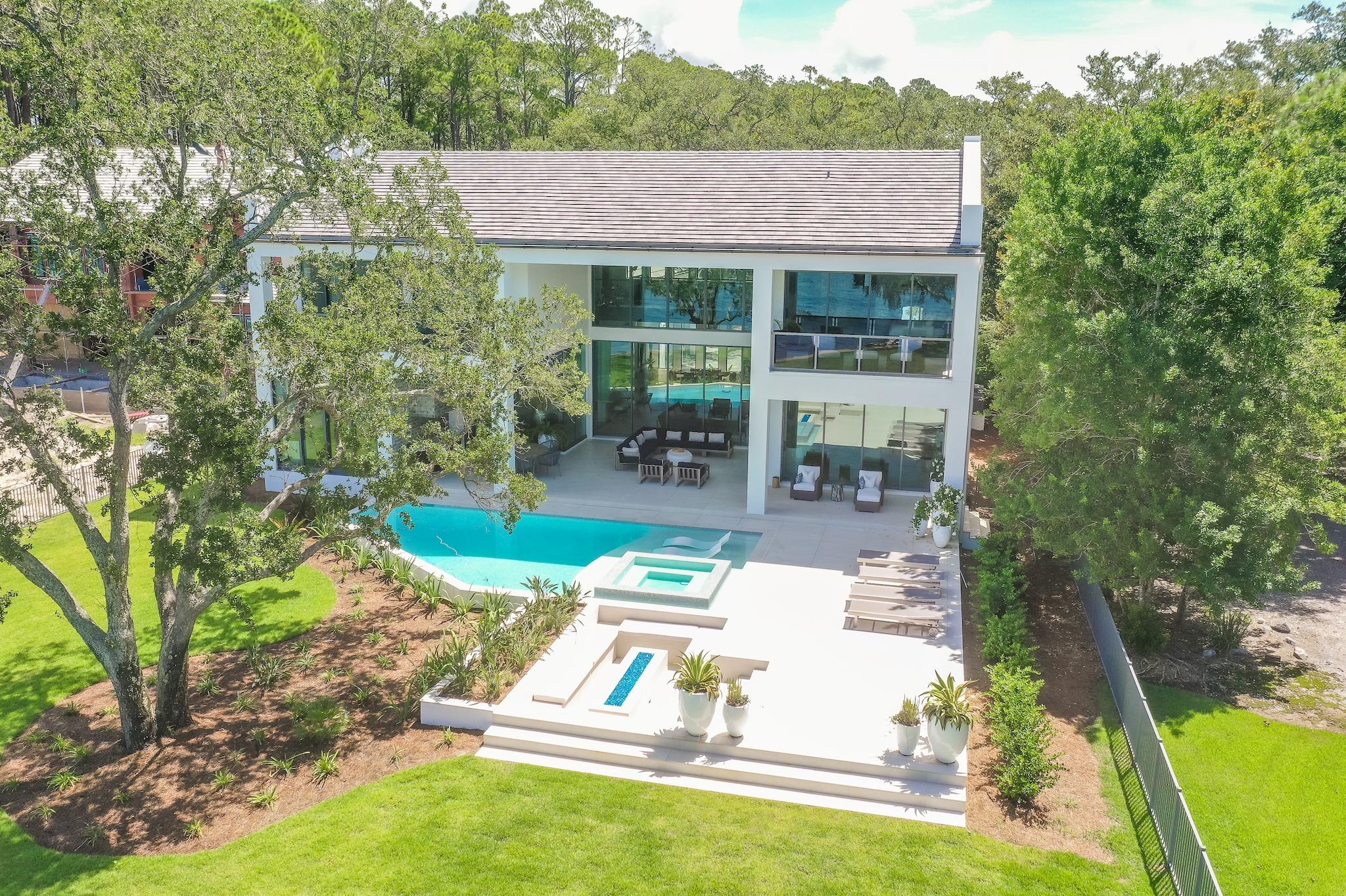 337 Driftwood Point Road Santa Rosa Beach, FL 32459 - Photo 3 of 82 an aerial view of a house with swimming pool garden view and trees