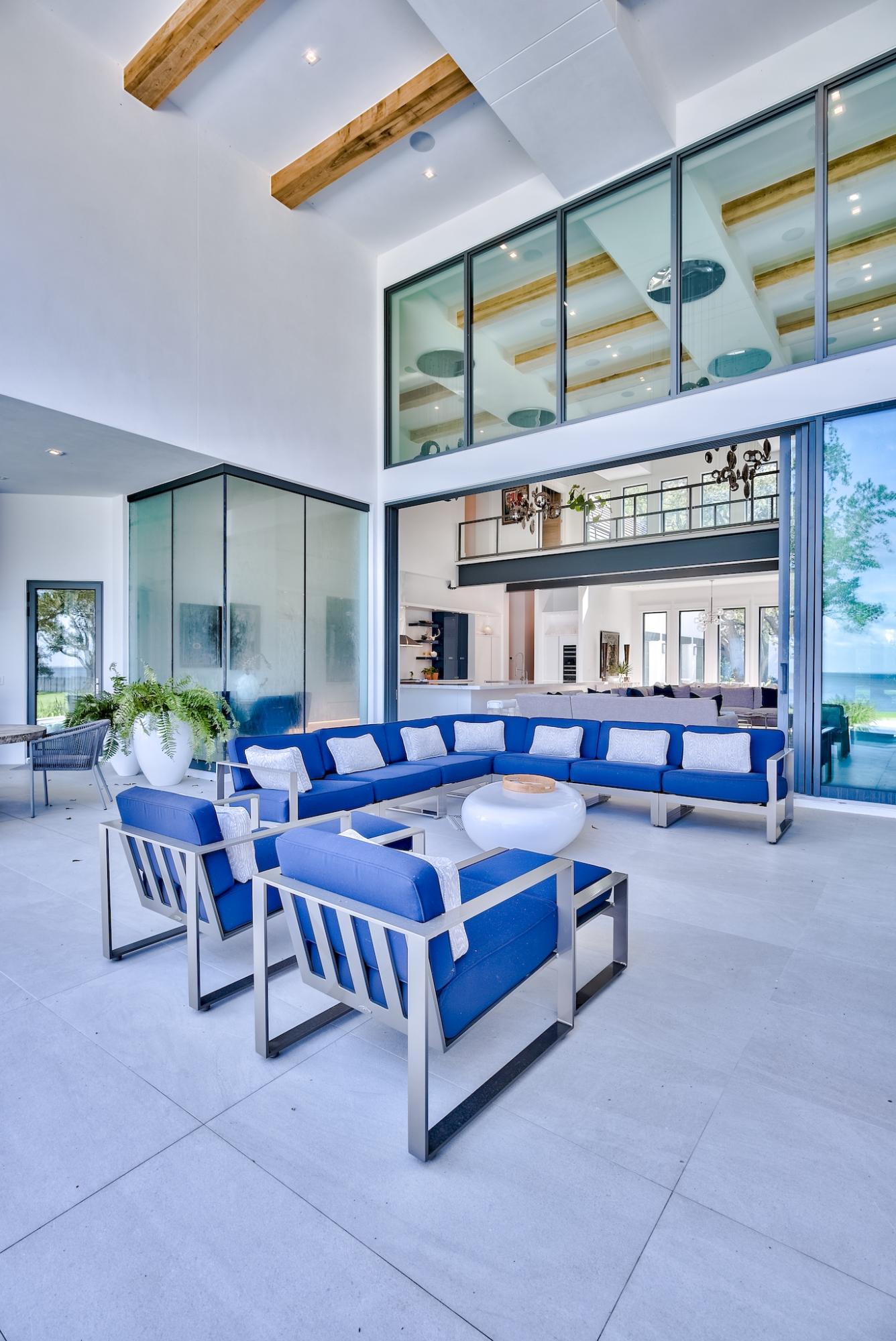 337 Driftwood Point Road Santa Rosa Beach, FL 32459 - Photo 34 of 82 a living room with furniture a rug and white walls