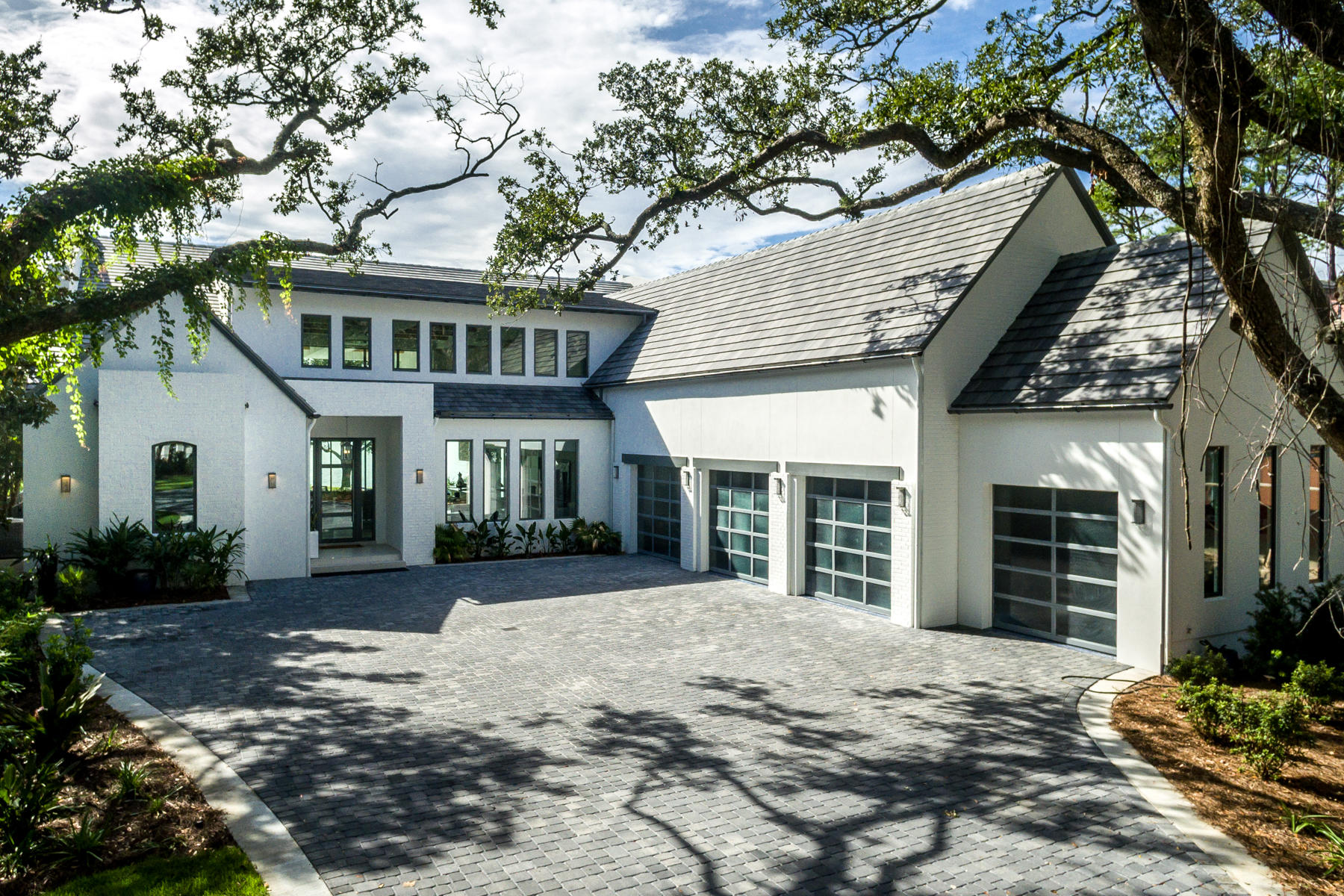 337 Driftwood Point Road Santa Rosa Beach, FL 32459 - Photo 4 of 82 a front view of a house with a yard and potted plants