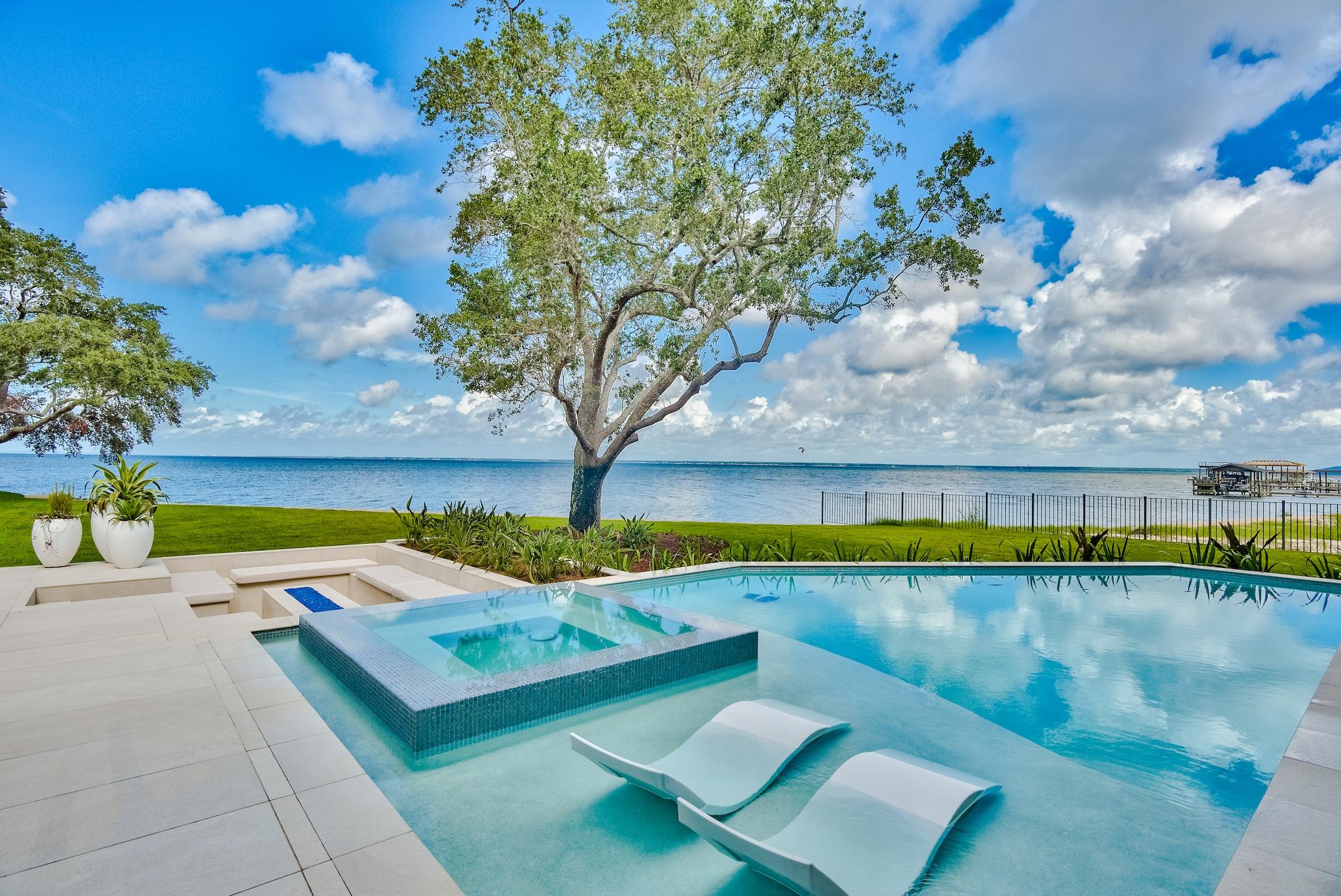 337 Driftwood Point Road Santa Rosa Beach, FL 32459 - Photo 41 of 82 a view of a swimming pool with an outdoor seating