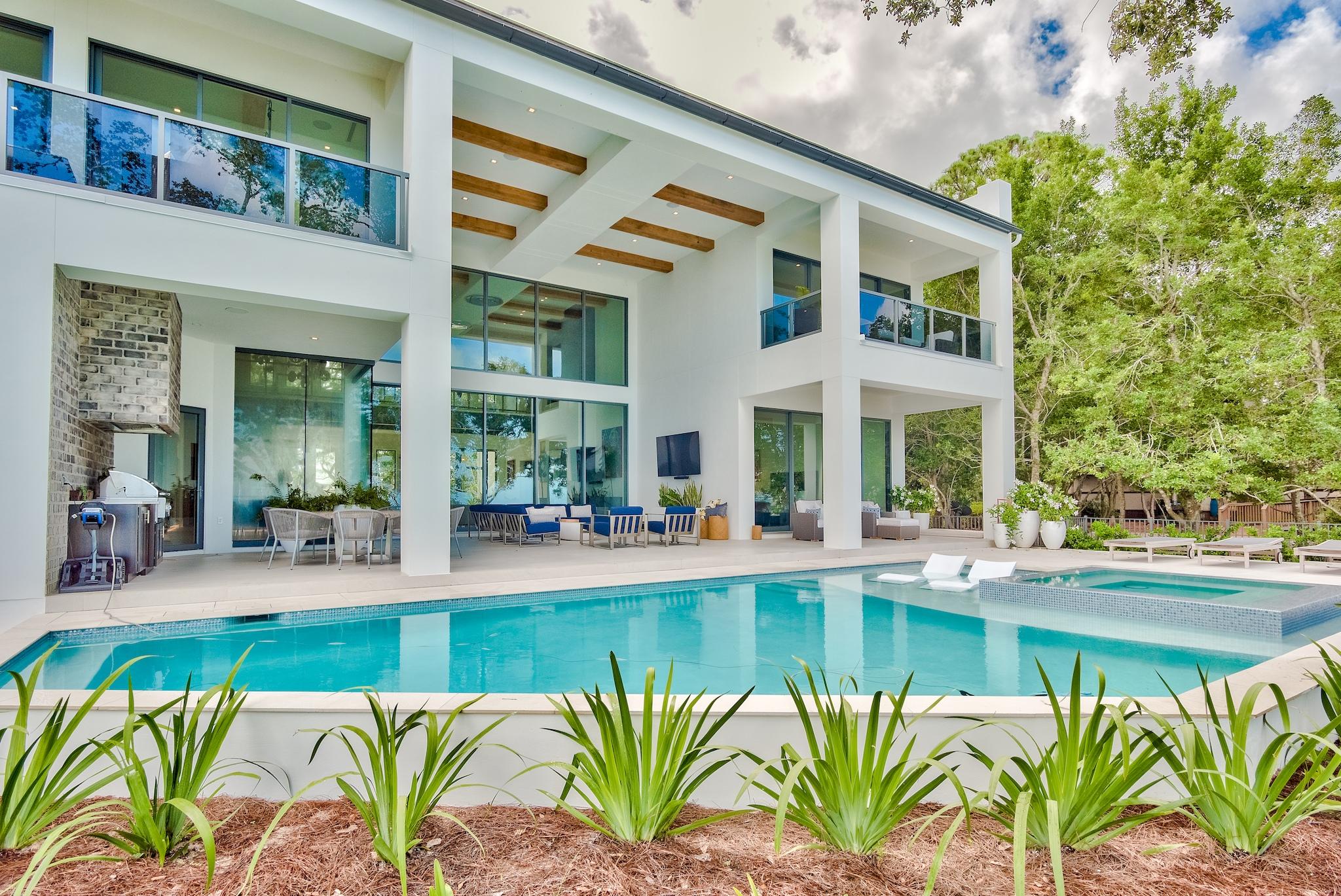 337 Driftwood Point Road Santa Rosa Beach, FL 32459 - Photo 45 of 82 a view of a chairs and table in a patio