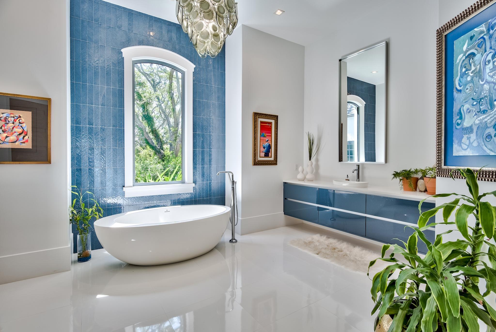 337 Driftwood Point Road Santa Rosa Beach, FL 32459 - Photo 65 of 82 a spacious bathroom with a tub a potted plant and a large window