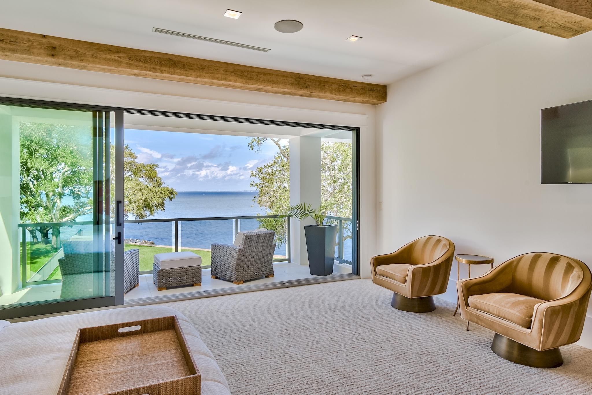 337 Driftwood Point Road Santa Rosa Beach, FL 32459 - Photo 79 of 82 a living room with furniture and a floor to ceiling window
