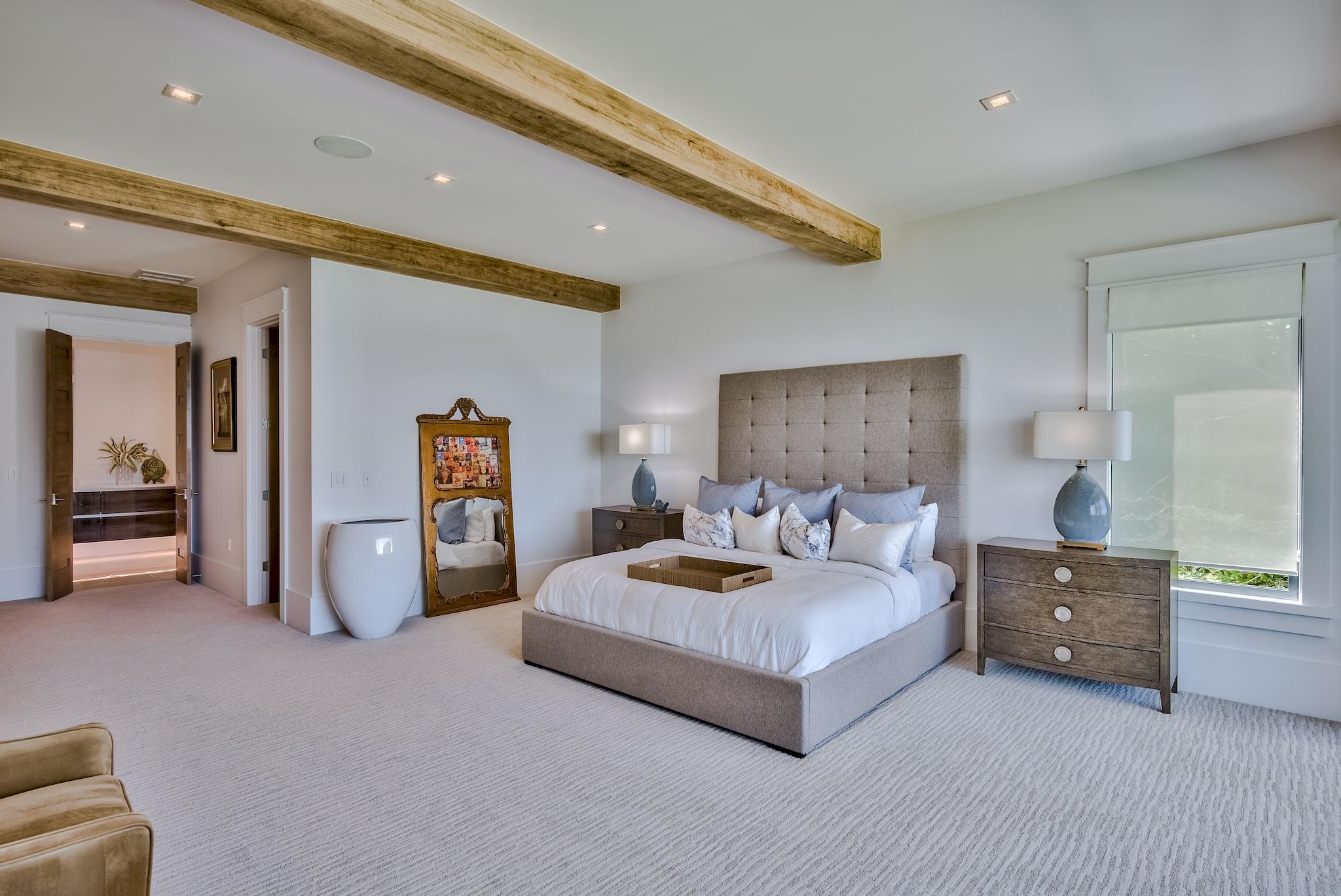 337 Driftwood Point Road Santa Rosa Beach, FL 32459 - Photo 81 of 82 a spacious bedroom with a bed and ceiling fan