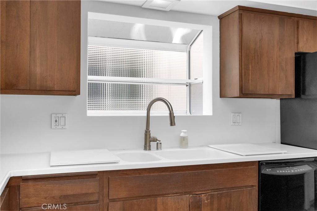 57 Surfside Avenue Surfside, CA 90743 - Photo 20 of 39 a close view of a sink and a microwave