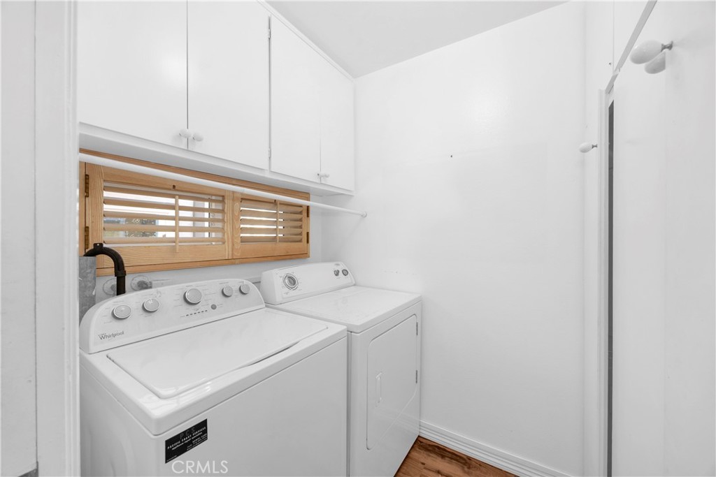 57 Surfside Avenue Surfside, CA 90743 - Photo 22 of 39 a utility room with dryer and washer