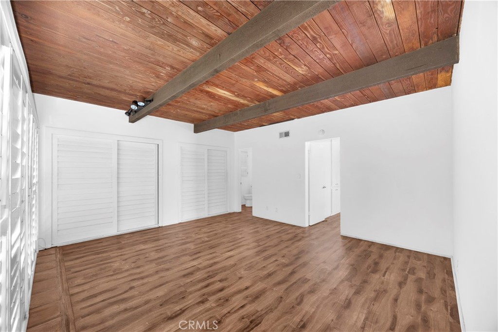 57 Surfside Avenue Surfside, CA 90743 - Photo 25 of 39 a view of empty room with wooden floor