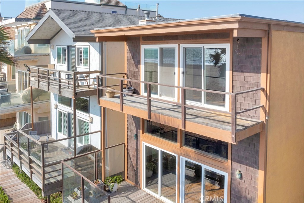 57 Surfside Avenue Surfside, CA 90743 - Photo 26 of 39 front view of a house with a large window