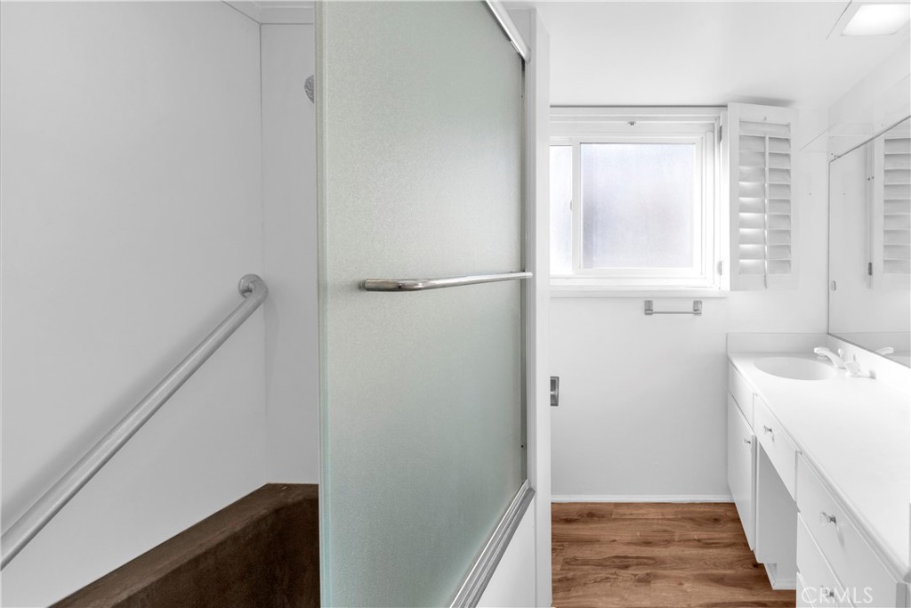 57 Surfside Avenue Surfside, CA 90743 - Photo 29 of 39 a bathroom with a sink and a vanity