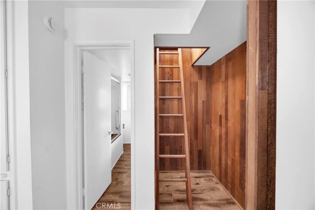 57 Surfside Avenue Surfside, CA 90743 - Photo 33 of 39 a view of a hallway with wooden floor and entryway