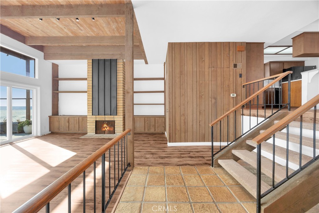 57 Surfside Avenue Surfside, CA 90743 - Photo 8 of 39 a view of an entryway with wooden floor and windows