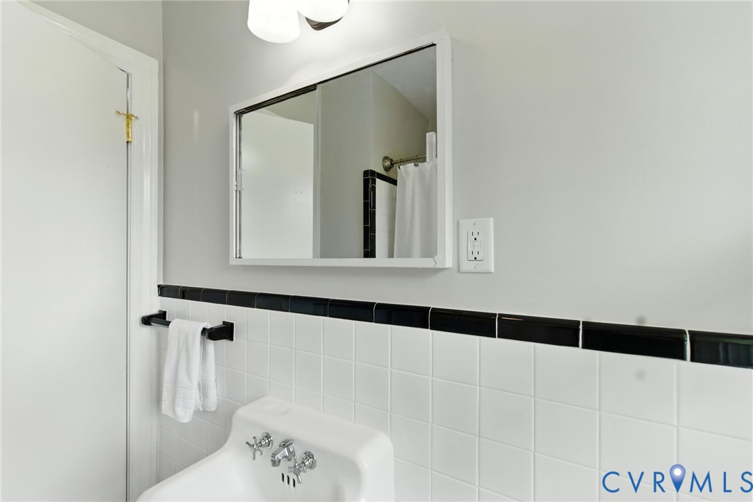 4825 Kinloch Lane Henrico, VA 23231 - Photo 15 of 28 a bathroom with a bathtub and a shower
