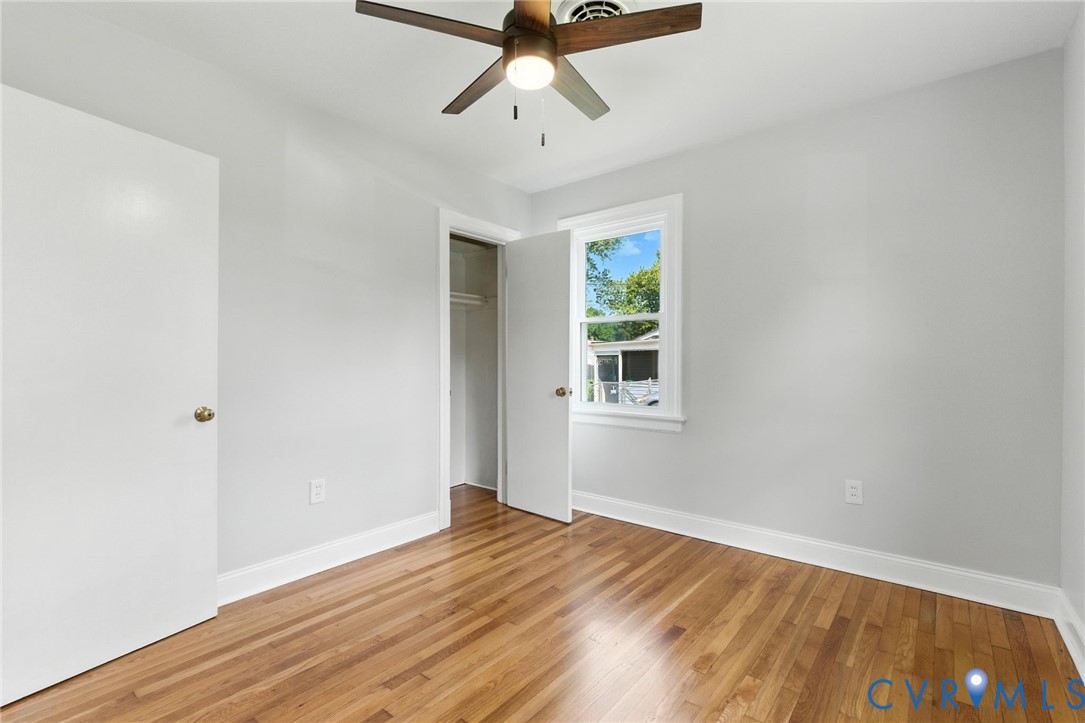 4825 Kinloch Lane Henrico, VA 23231 - Photo 22 of 28 a view of empty room with wooden floor and fan