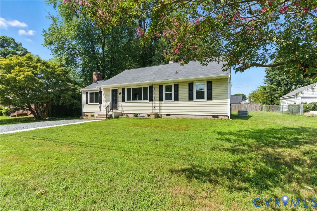 4825 Kinloch Lane Henrico, VA 23231 - Photo 27 of 28 a front view of house with yard and green space