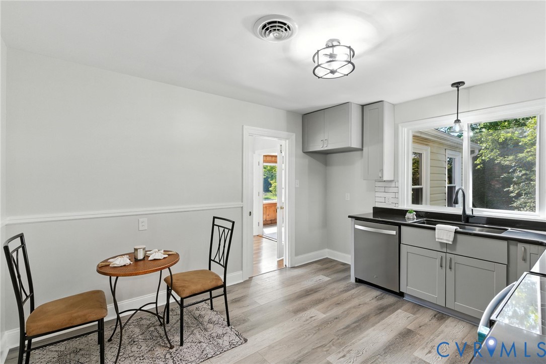 4825 Kinloch Lane Henrico, VA 23231 - Photo 3 of 28 a view of a dining room with furniture window and wooden floor