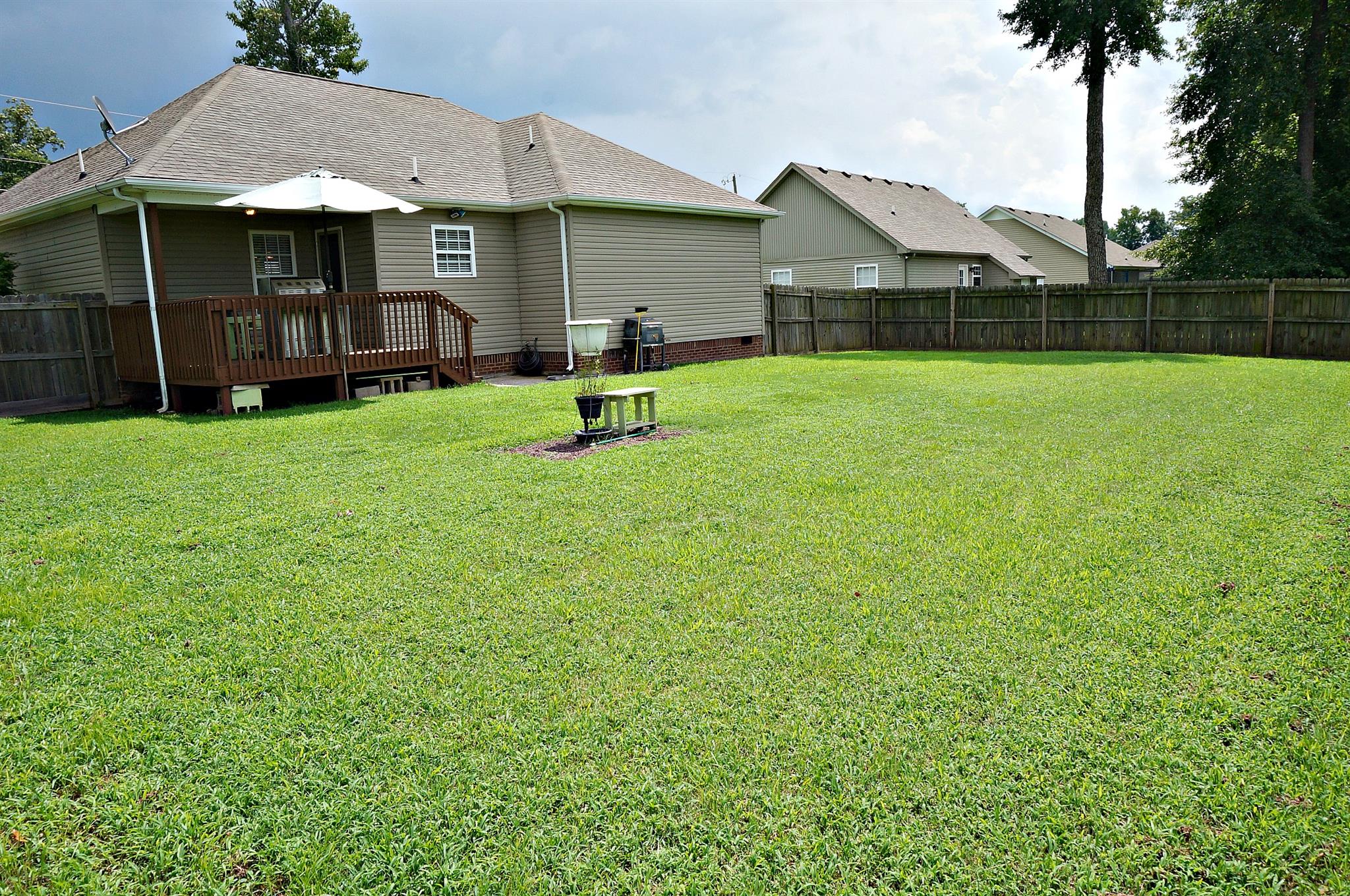 128 Filly Lane Springfield, TN 37172 - Photo 21 of 23 a view of a house with a yard and sitting area