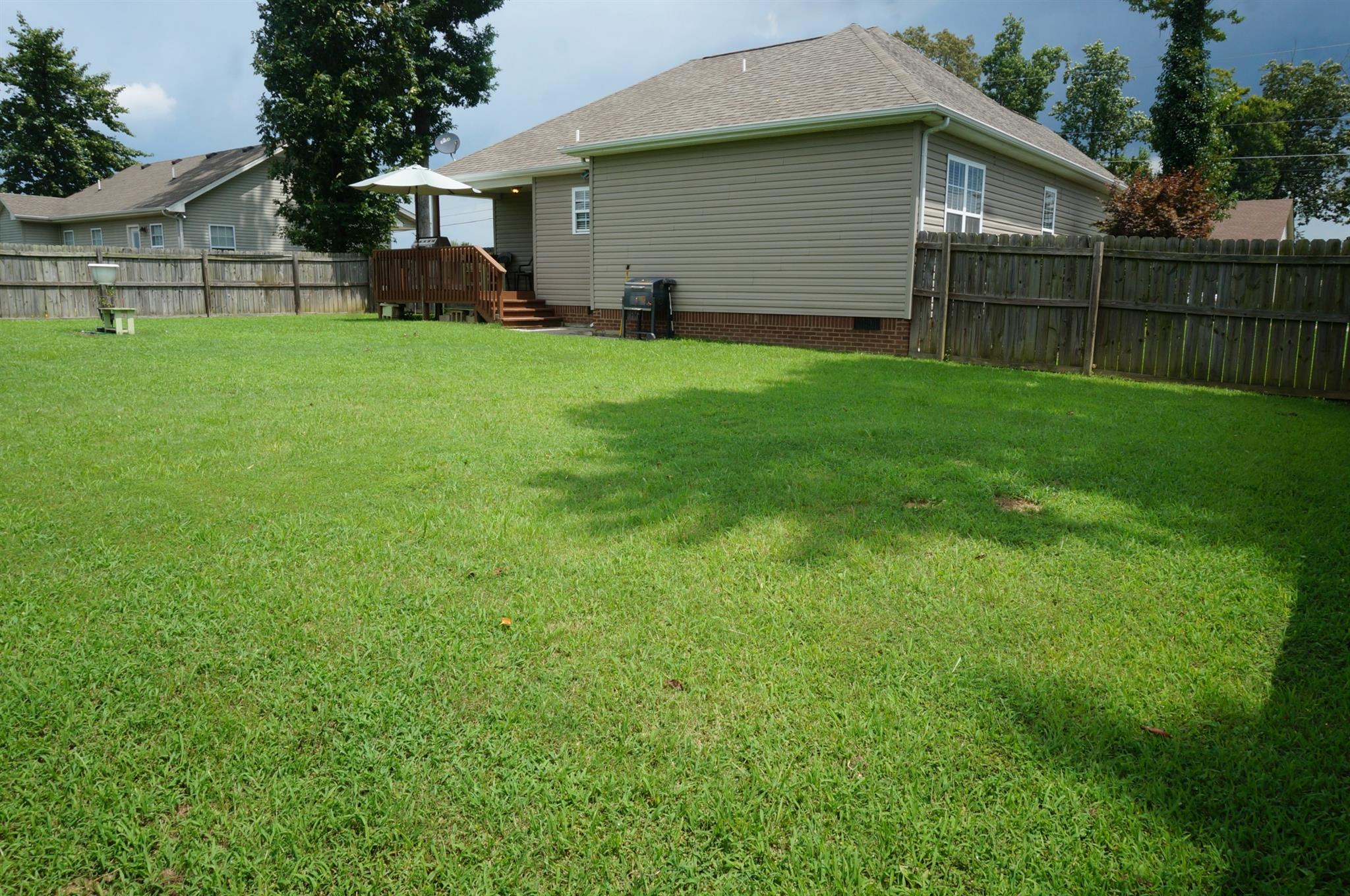 128 Filly Lane Springfield, TN 37172 - Photo 23 of 23 a view of a backyard with a garden