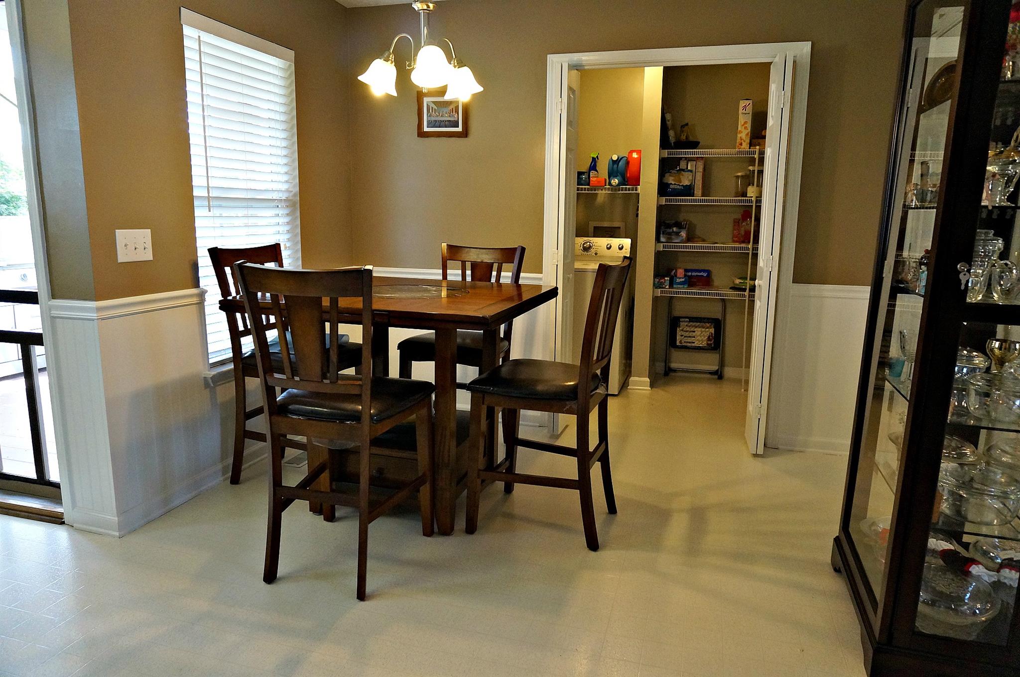 128 Filly Lane Springfield, TN 37172 - Photo 6 of 23 a view of a dining room with furniture and a chandelier
