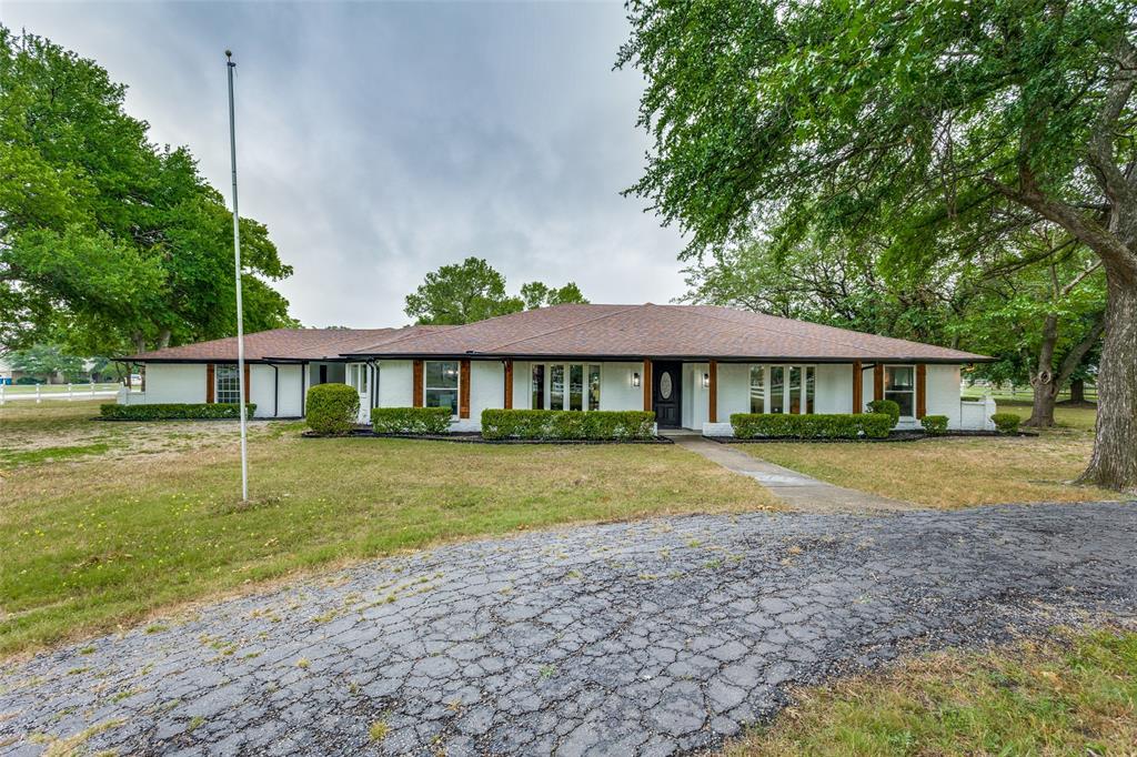 5110 Old Gate Lane Parker, TX 75002 - Photo 1 of 1 a front view of a house with a yard