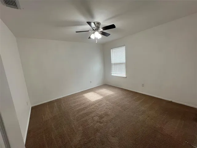 a view of empty room with window