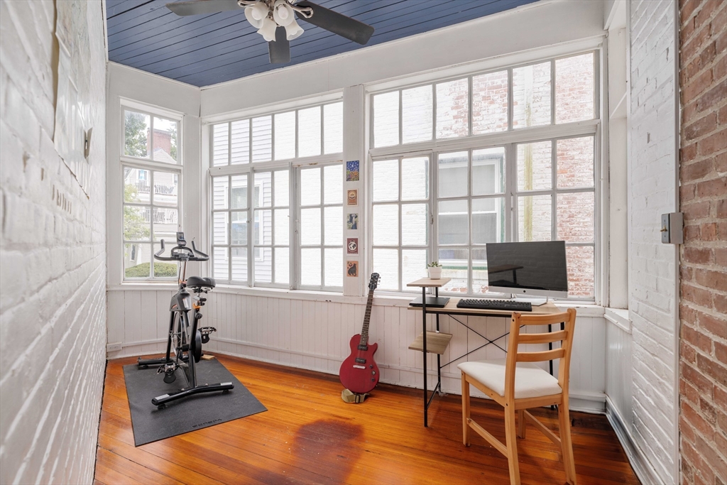 503 Boylston Street, Unit 4 Brookline, MA 02445 - Photo 12 of 16 a view of a workspace with furniture and a window