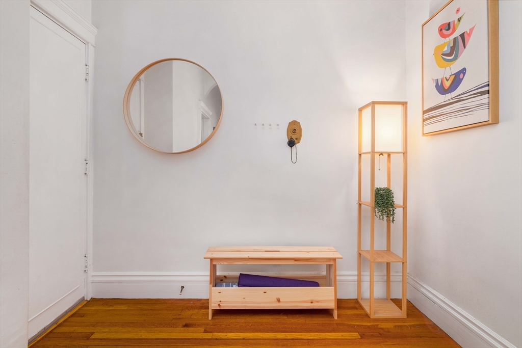 503 Boylston Street, Unit 4 Brookline, MA 02445 - Photo 2 of 16 an empty room with a window