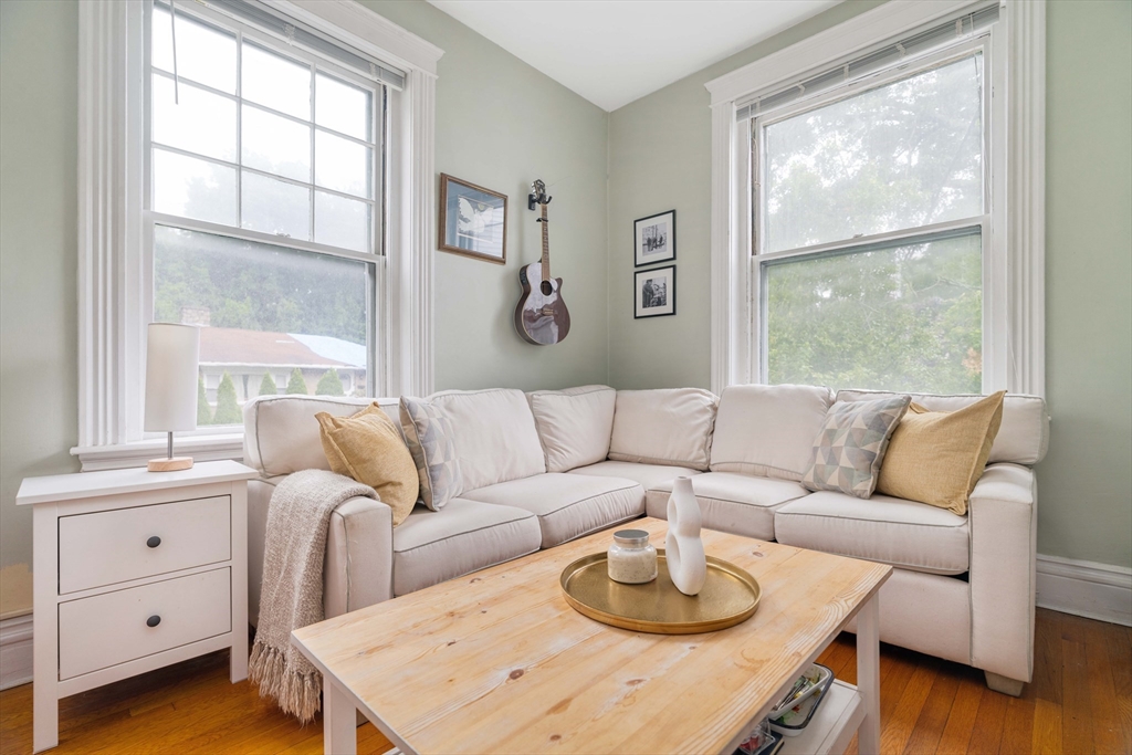 503 Boylston Street, Unit 4 Brookline, MA 02445 - Photo 10 of 16 a living room with furniture and a window