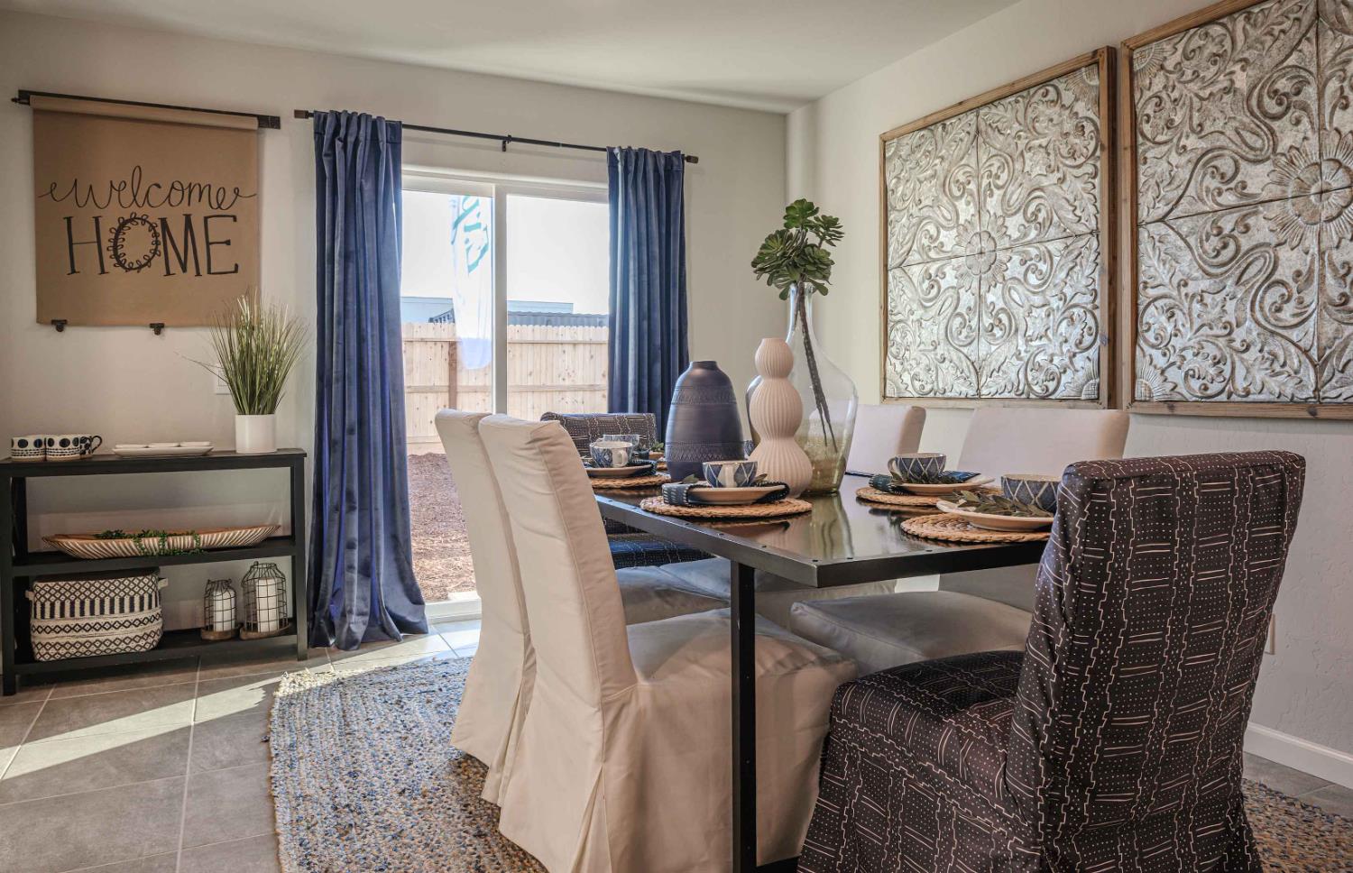 64 River Oak Court, Unit 47 Merced, CA 95341 - Photo 7 of 18 a view of a dining room with furniture window and outside view