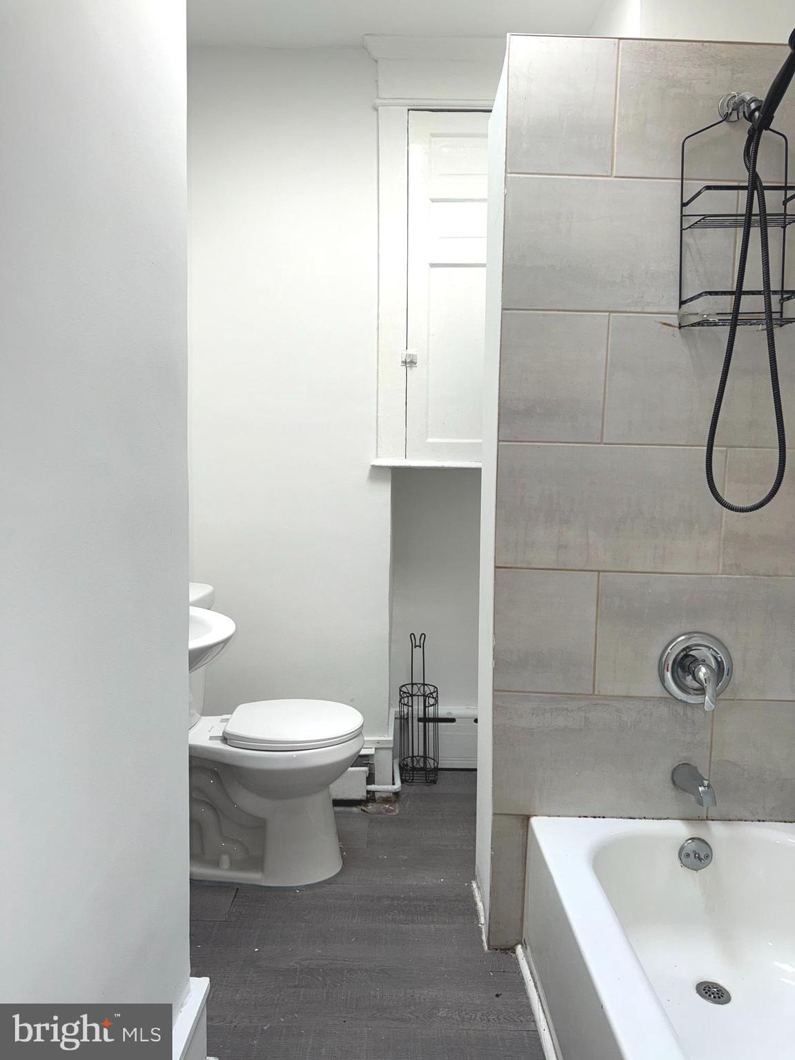 5756 Hunter Street Philadelphia, PA 19131 - Photo 13 of 16 a bathroom with a sink a toilet and shower